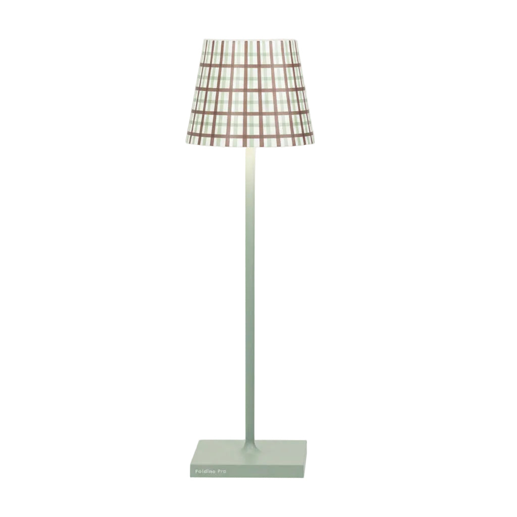 Floor lamp with a plaid shade on a white background